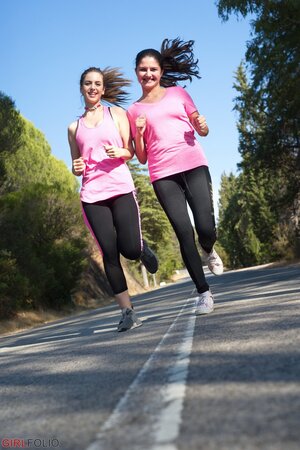Lesbian friends are caught posing without clothes while changing after the jog