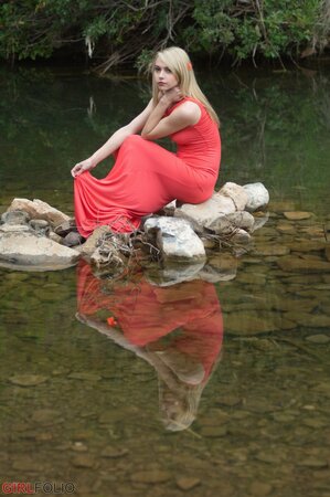 Gorgeous blonde loves posing outdoors and is ready to reveal titties