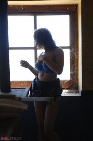 Playful bimbo agrees to reveal her perky assets in the abandoned café