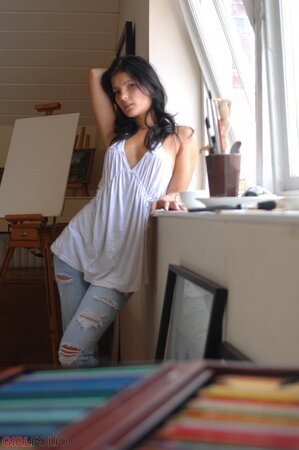 Lovely brunette lassie reads in erotic journal how to strike sexiest poses