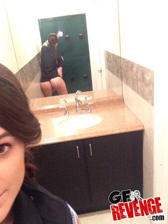 Horny young policewoman poses naked by the mirror before fucking in the toilet