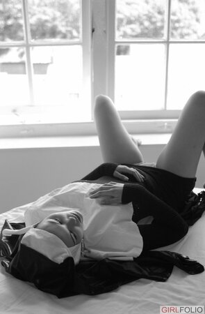 Shameless nun reveals tits while spreading legs to masturbate her cunny