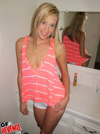 Lustful blonde beauty gets naked to reveal her pink coochie and small tits