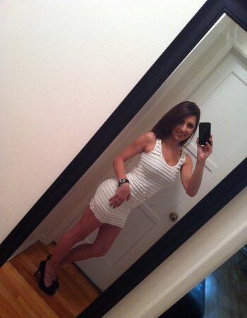 Luscious brunette chick is ready to pull clothes off to show tits and cunny