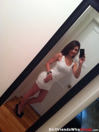 Luscious brunette chick is ready to pull clothes off to show tits and cunny