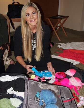 Blonde seductress changes clothes and reveals her flawless body at home
