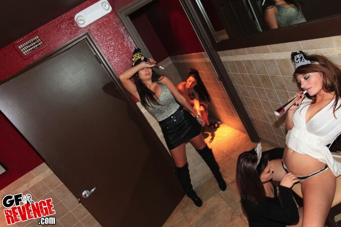 Lesbian bitches get drunk and lick each other's twats in public toilet
