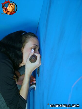 Black-haired MILF masturbates while giving BJ to black stranger via gloryhole
