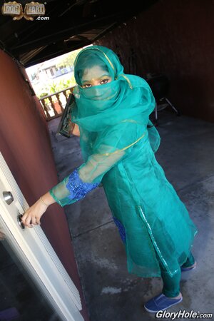 Curvy Indian gal with big ass giving her first time gloryhole blowjob to BBC