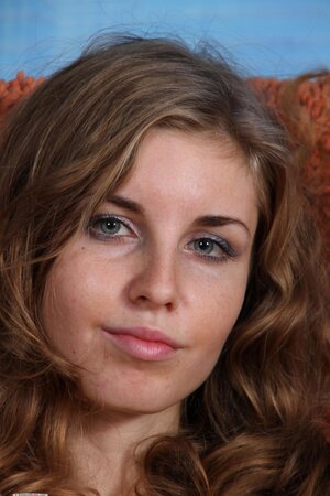 Charming brunette removes clothes to show every inch of her tempting body