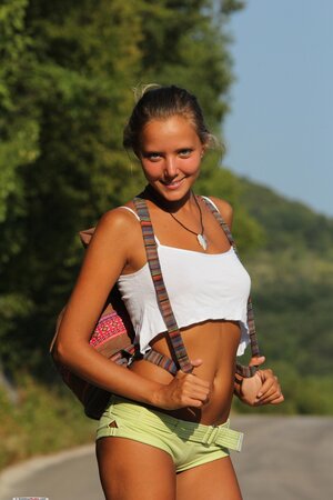 Luscious teen spreads her thin legs to shows off tight coochie by the road