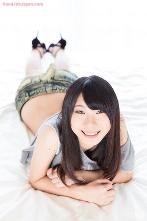Nice Japanese minx flashes naked smooth pussy before having fun with dick