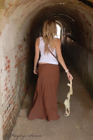 Totally shameless blonde flashing her tits and butt while taking a walk