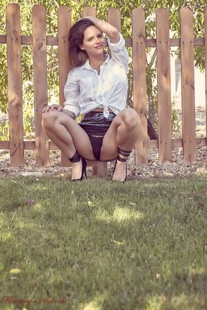 Beautiful young belle doffs clothes to tempt with her perfect tits outdoors