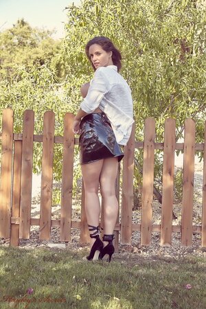 Beautiful young belle doffs clothes to tempt with her perfect tits outdoors