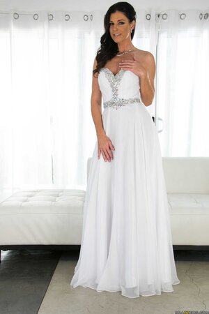 Beautiful minx with sexy body shows what she hides under her wedding dress