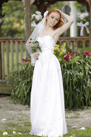 Pretty red-haired bride discards wedding dress to flaunt her sexy skinny body