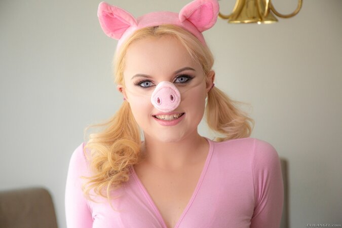 Pale-skinned lovely wears pig ears and nose presenting solo naked pictures