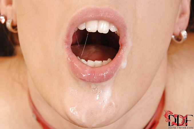Tied up beauty gives deepthroat blowjob and receives load of cum into mouth