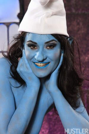 Juicy chick dressed like naughty Smurf exposes her perky tits and pink cunny