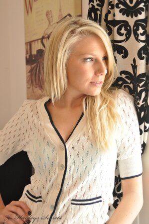 Lecherous blond gal sensually poses naked to reveal her sweetest parts