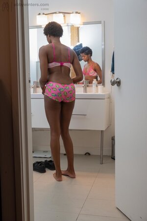 Small boobs ebony girl showing her long legs and teasing too