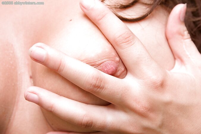 Girl with big natural breasts fingers herself while outside
