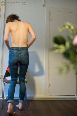Geeky girl with a sexy ass shows what she was hiding before