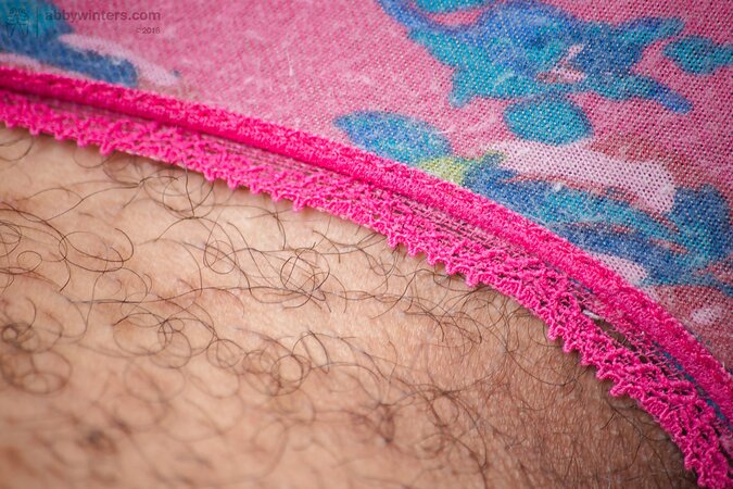 Frizzy hair hottie shows her big black hairy pussy for you