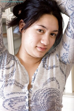 Angela B shows her incredible Asian body like a true teaser
