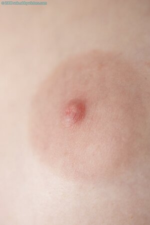 Adorable lady with natural boobs shows her tiny wet slit too