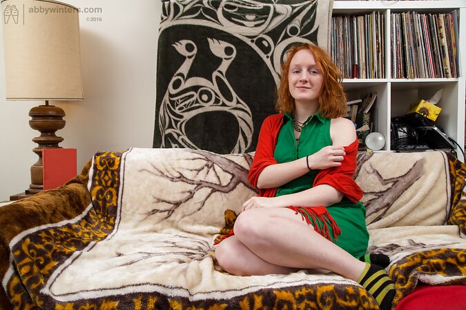 Redheaded firecrotch brushing her pussy hair and looking good