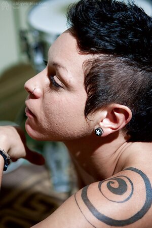 Punk rock girl Jane A is showing her intensely hairy cunt