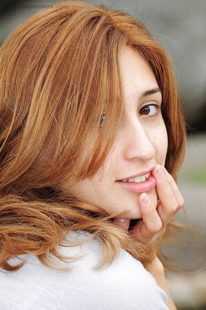 Redheaded Latina shows her gorgeous bushy twat while outside