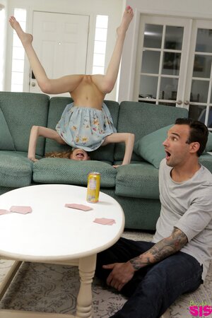 Thin girl does headstands and teases bro before they bang