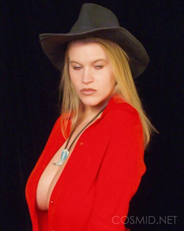 Sexy hat lady is here to showcase her boobies and look great