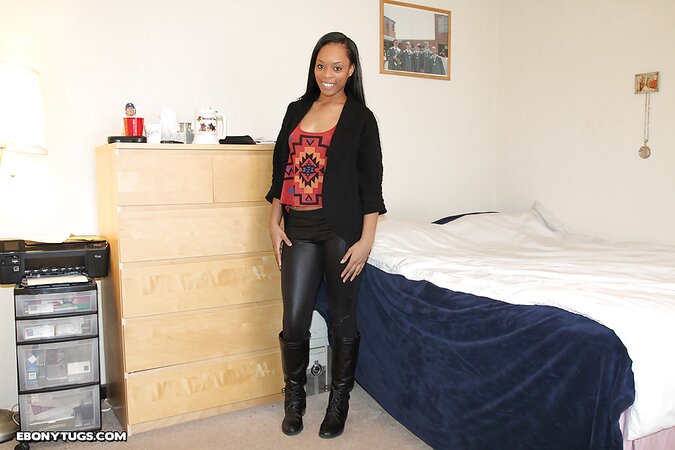 Black babe with a hot bod wears leather pants and looks sublime