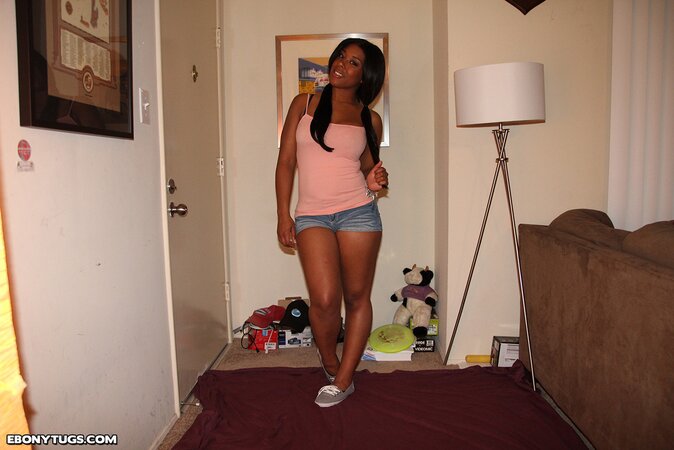 Brunette looks sensational as she teases us with her dark skin