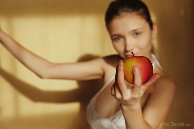 Food fetishist exposing her boobies and looking rather seductive