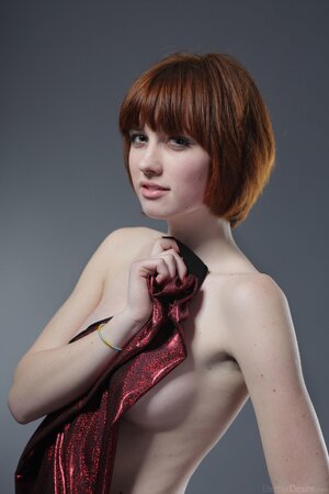 Natural redheaded tomboy looks perfect in her solo gallery