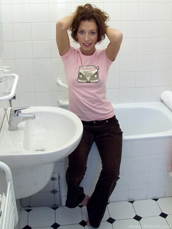 Michaela Kovarova is in the bathroom and plays with her cunt