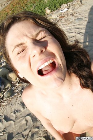 Audrina Ashley doing frisky things on the beach with her man