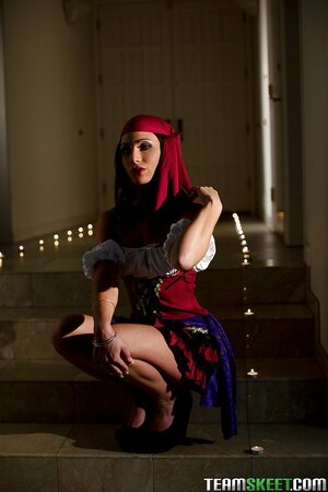 Mysterious brunette slowly flashes tits and masturbates in the dark room