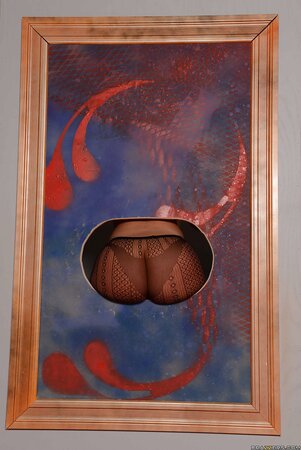 Female has fun on all cylinders exposing big rear as a masterpiece in the gallery