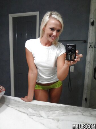 Towheaded colleen slips her panties whilst posing and taking selfies