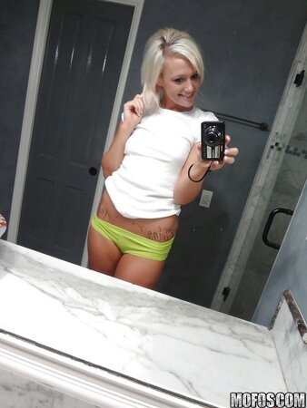 Towheaded colleen slips her panties whilst posing and taking selfies