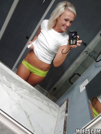 Towheaded colleen slips her panties whilst posing and taking selfies