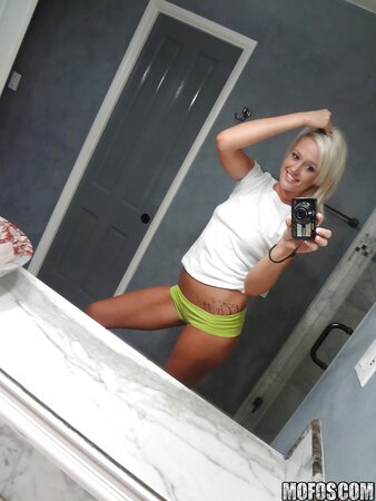 Towheaded colleen slips her panties whilst posing and taking selfies