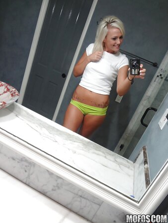 Towheaded colleen slips her panties whilst posing and taking selfies