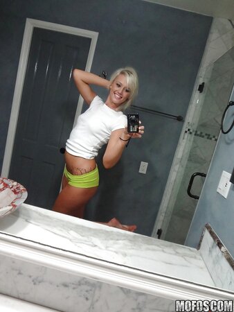 Towheaded colleen slips her panties whilst posing and taking selfies
